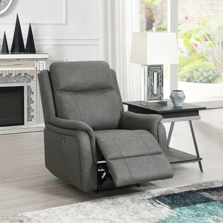 Stone grey armchair recliner with padded arms in modern living room beside side table