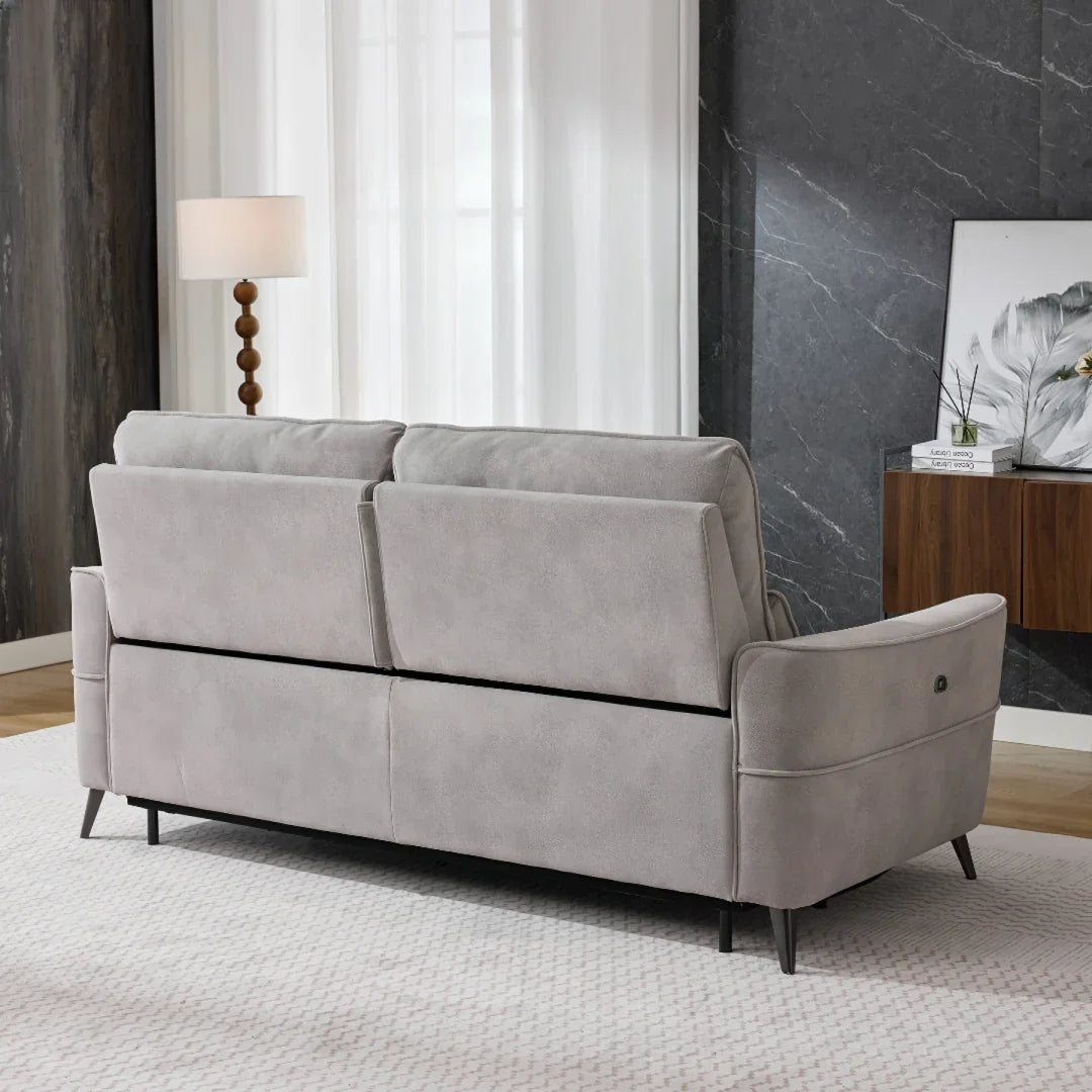 Oyster fabric power headrest sofa with slim black legs, rear view in modern living room