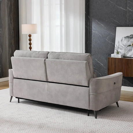 Oyster fabric power headrest sofa with slim black legs, rear view in modern living room