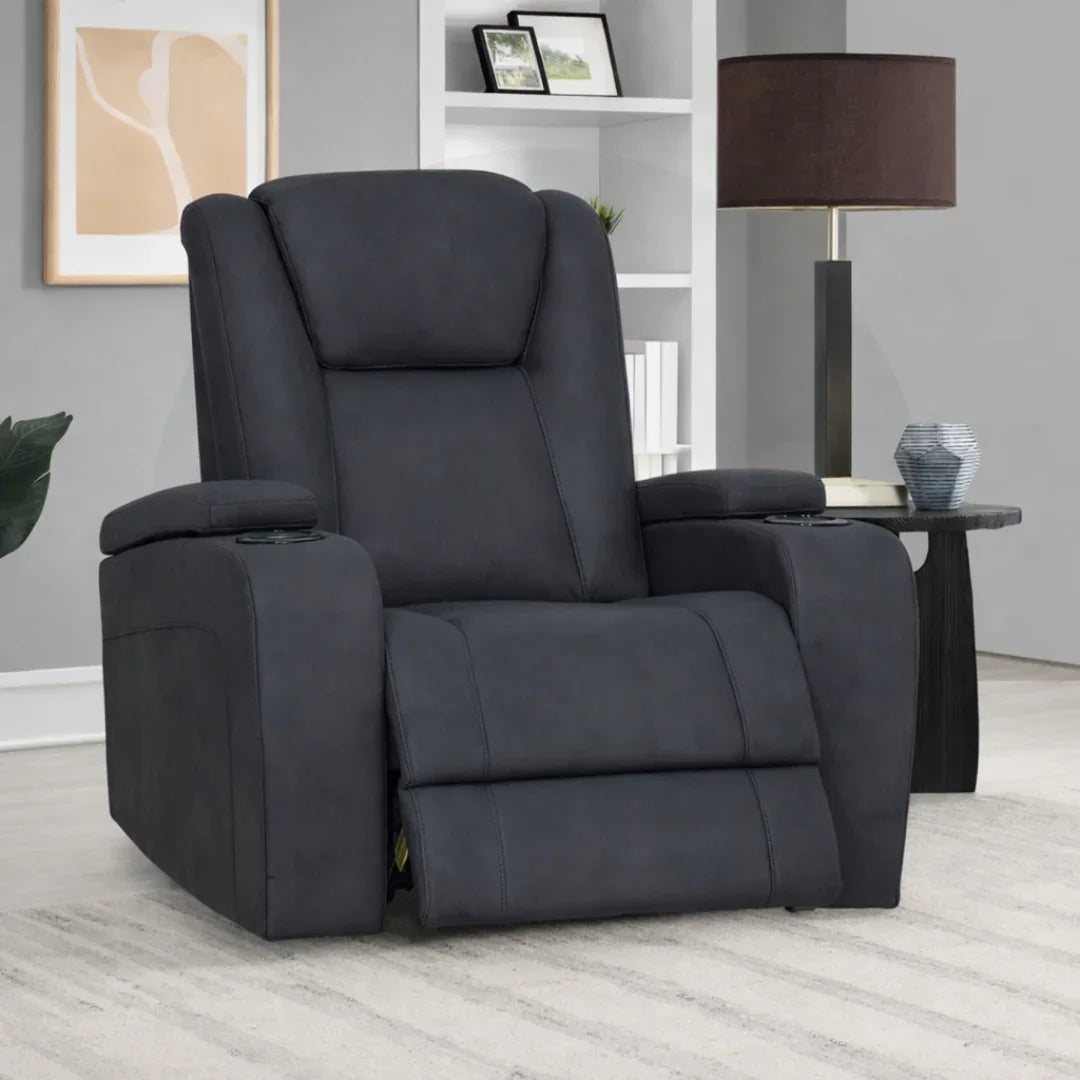 Graphite fabric recliner armchair with padded arms in modern living room setting