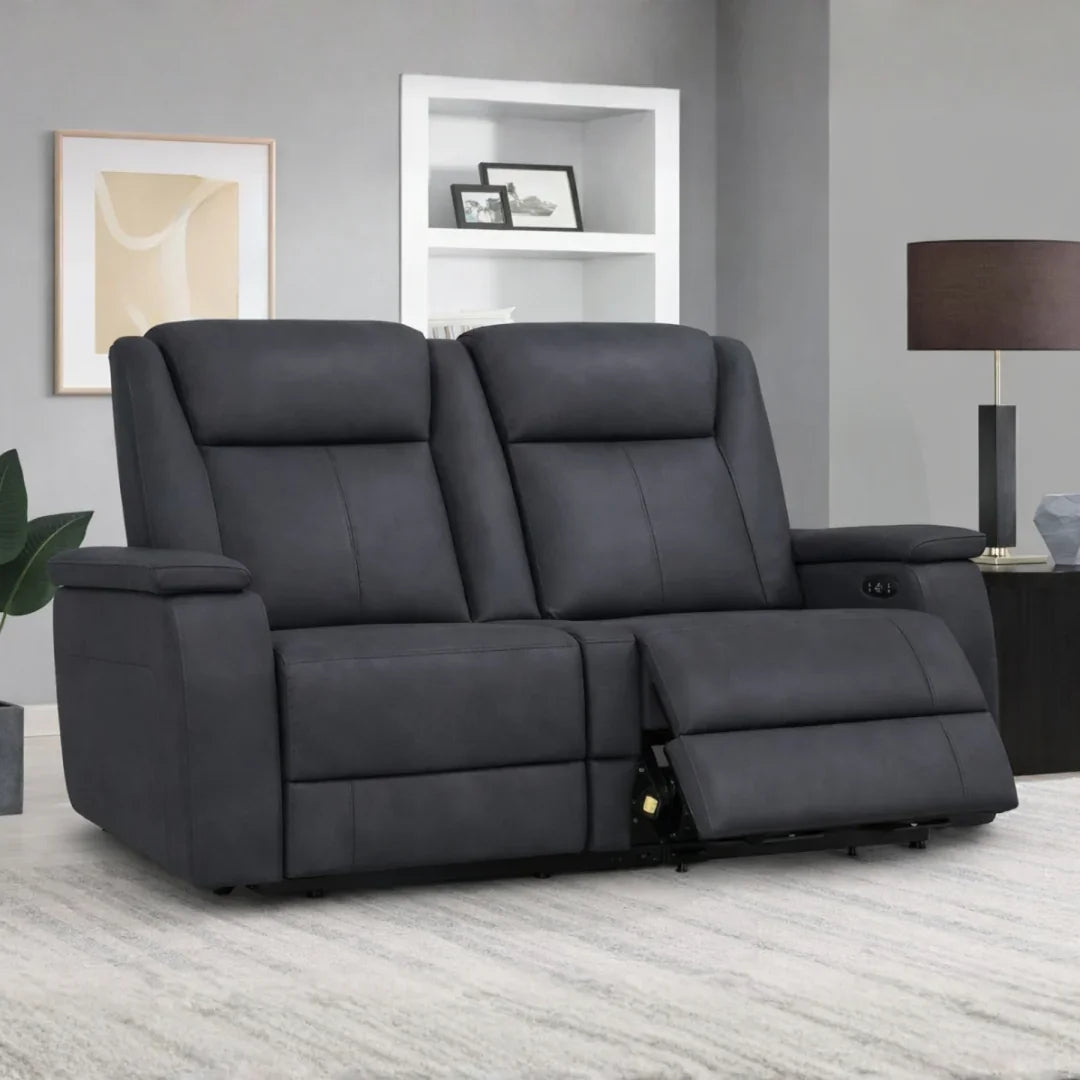 Graphite fabric loveseat sofa with dual recliner seats in modern living room setting