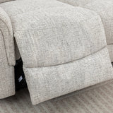 Beige fabric recliner sofa footrest extended on patterned carpet
