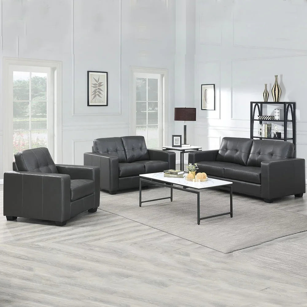 Black leather 2 seater sofa with armchair and 3 seater in modern living room setup