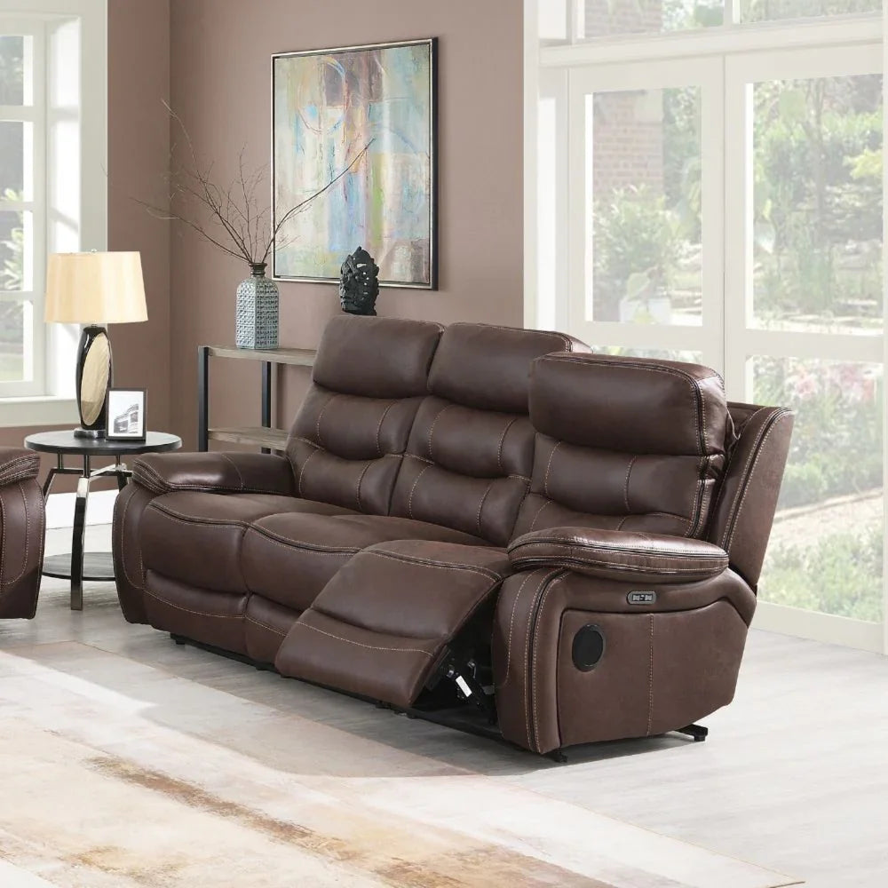 Brown leather recliner sofa with padded seats in modern living room setting