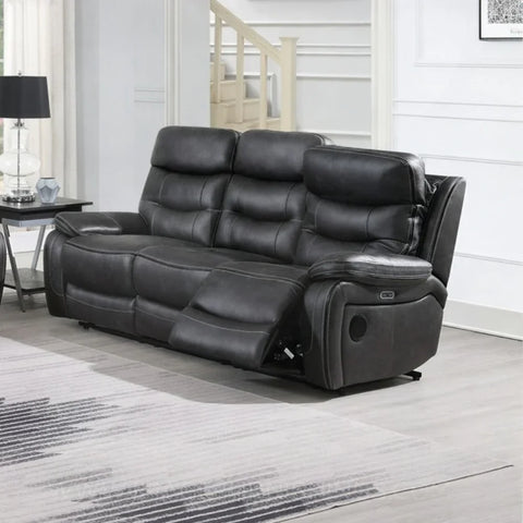 Slate grey recliner sofa with padded seats and matching piping in modern living room