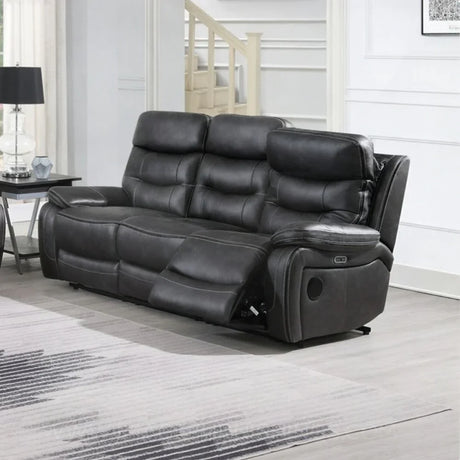 Slate grey recliner sofa with padded seats and matching piping in modern living room