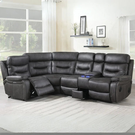 Slate grey sectional reclining sofa with console, cup holders, and matching piping in living room