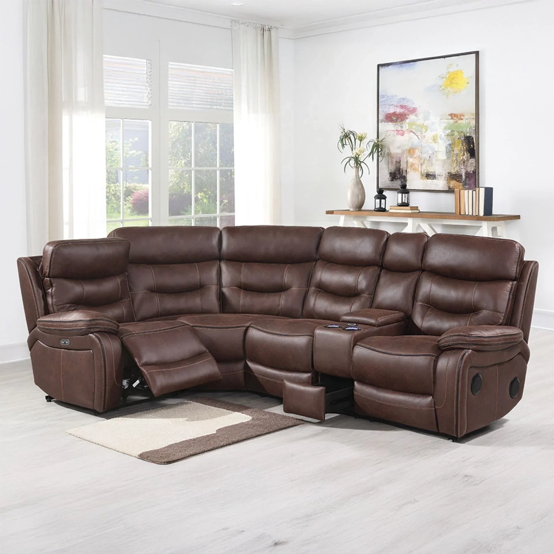 Chocolate brown sectional sofa with recliners and console in modern living room