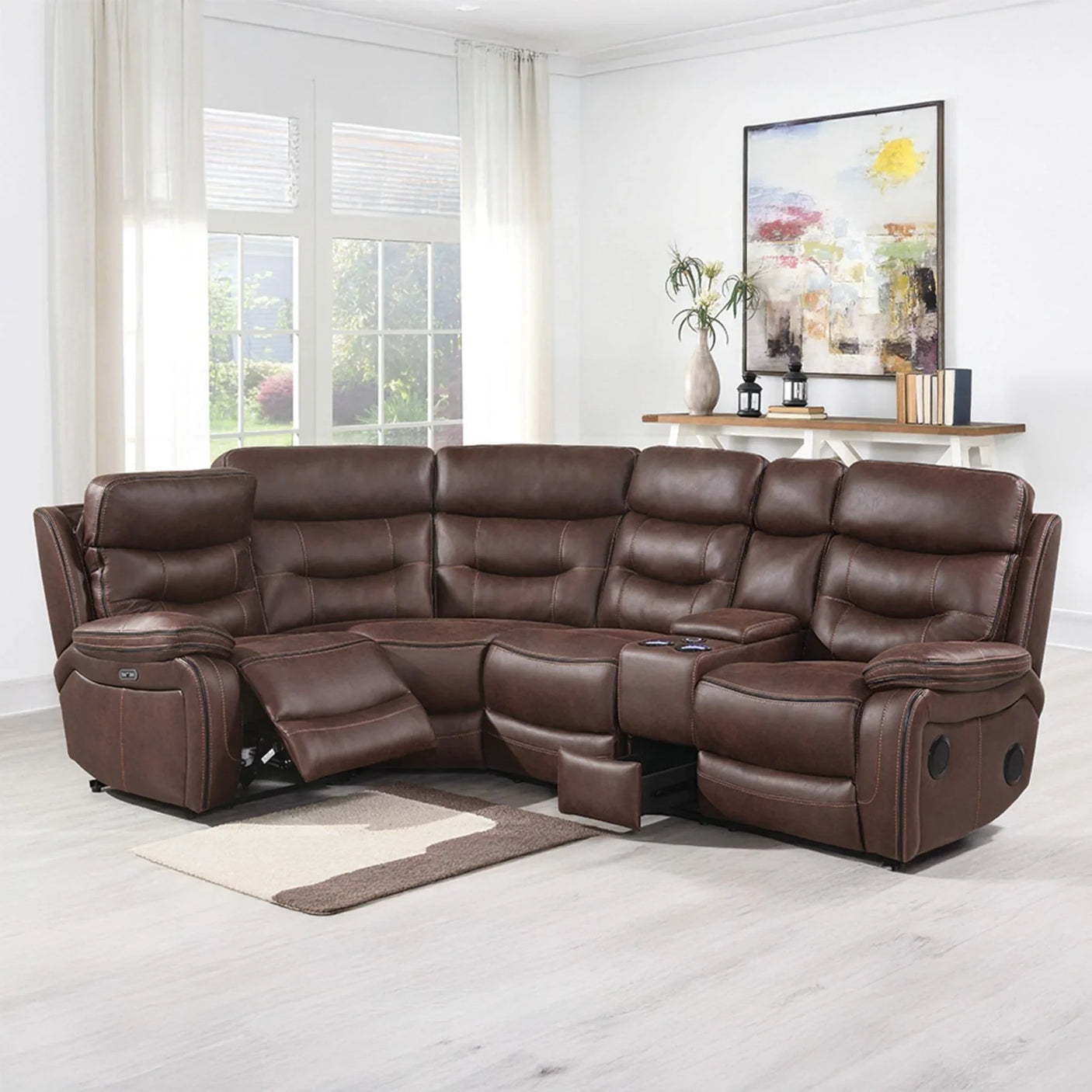 Brown leather corner sectional sofa with recliner and central console in living room