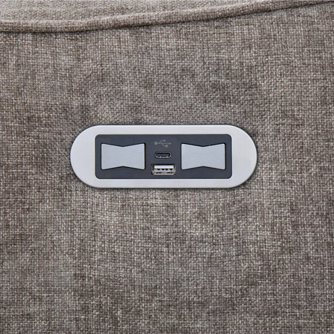 Closeup of USB charging ports on stone fabric Cupar 1 seater armchair