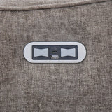 Closeup of USB charging ports on stone fabric Cupar 1 seater armchair
