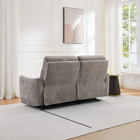 Rear view of stone fabric 2 seater sofa on light rug in bright living room