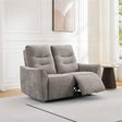 Two seater fabric recliner sofa in stone grey with footrest extended, modern living room setting