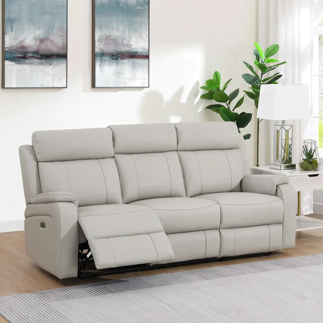 Light grey leather 3 seater sofa with recliner in modern living room setting