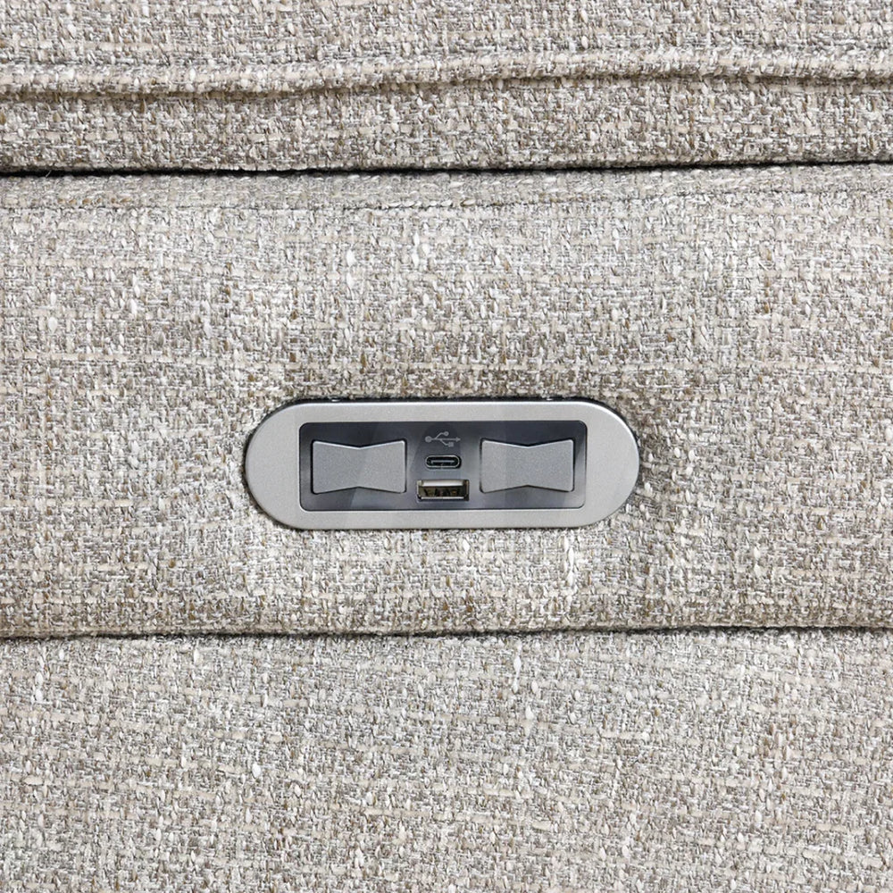 Beige fabric sofa armrest with built-in USB and USB-C charging ports