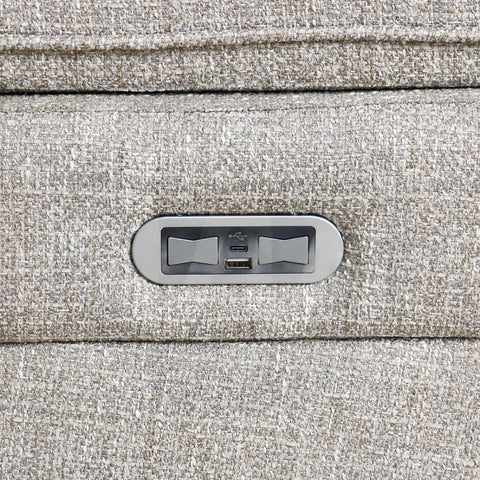 Beige fabric sofa armrest with built-in USB and USB-C charging ports