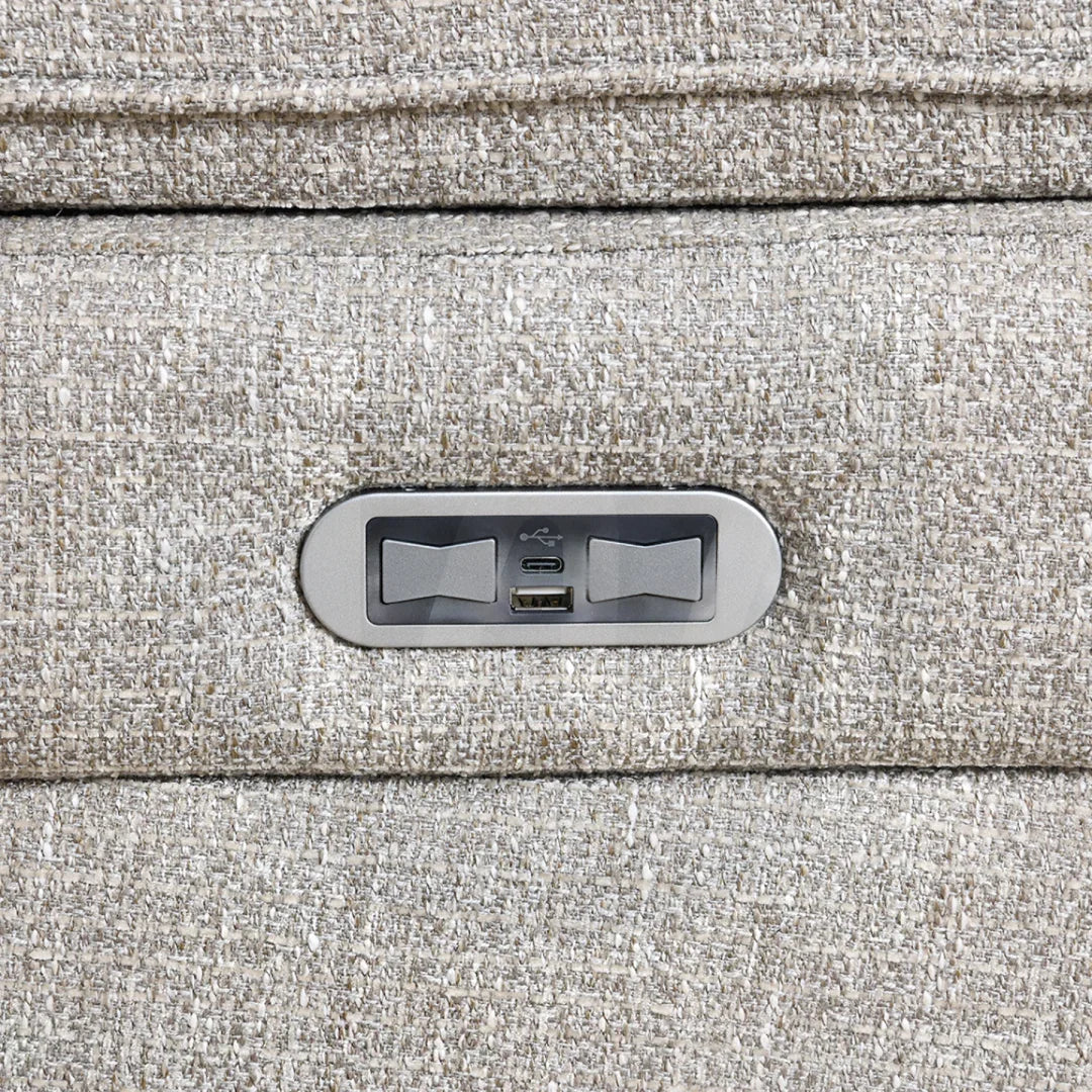 Beige fabric sofa armrest with built-in USB and USB-C charging ports