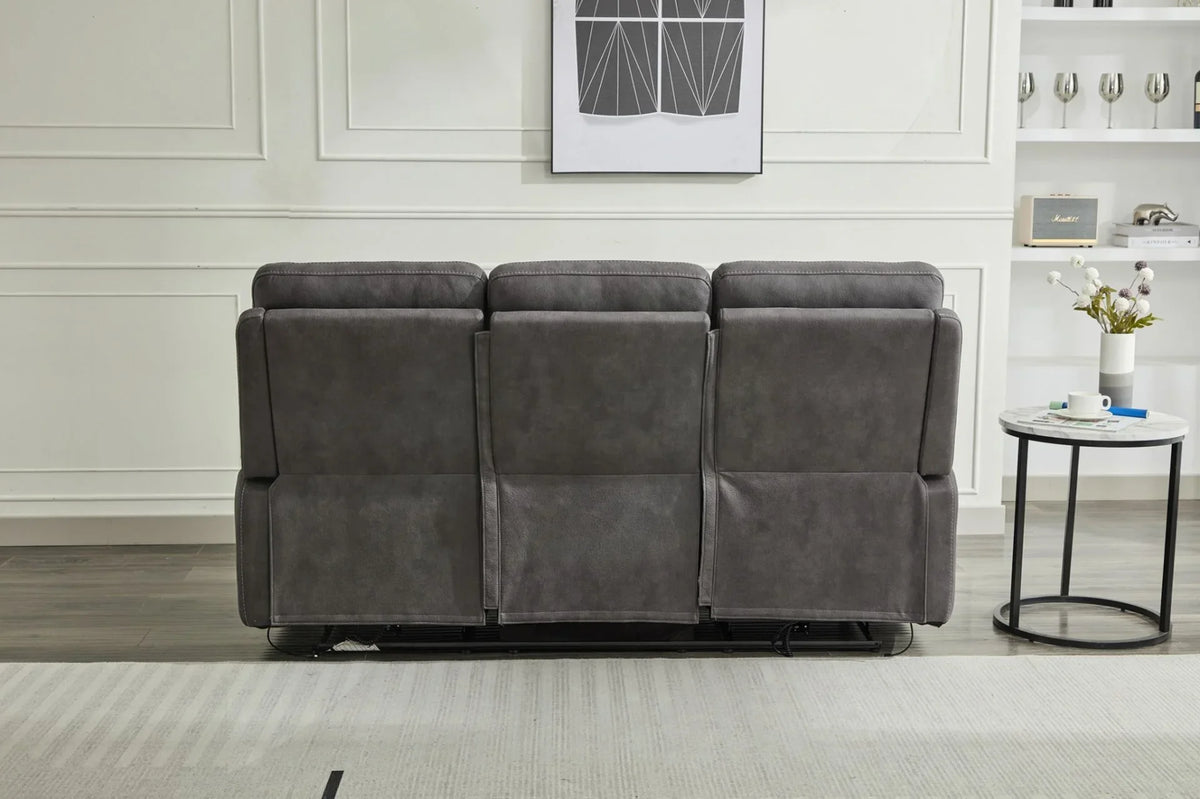 Back view of grey 3 seater sofa in modern living room with side table and decorative art