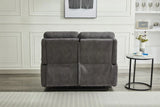 Back view of grey two seater fabric sofa beside round marble side table in modern room