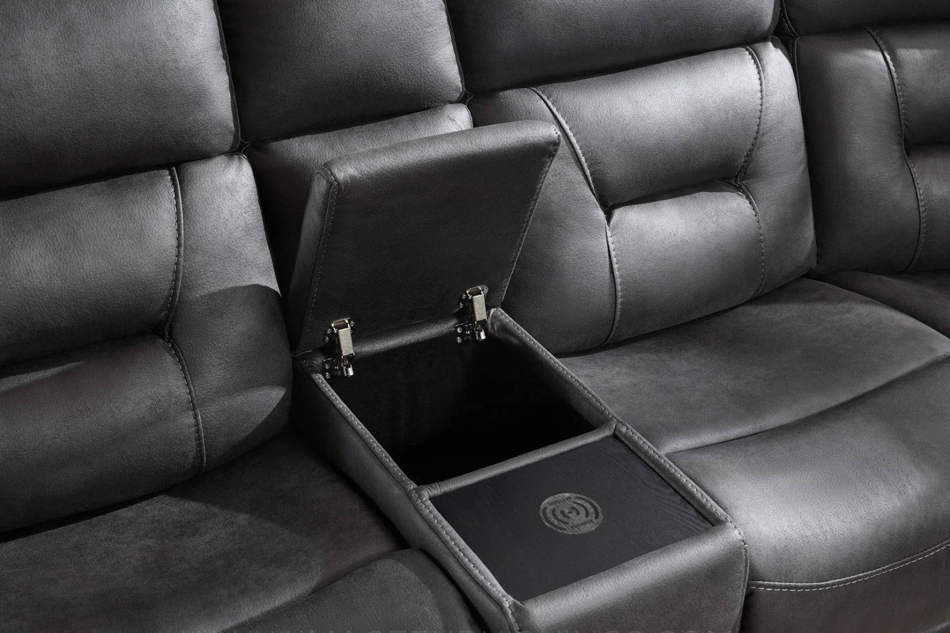 Grey sectional sofa with open centre storage and wireless charging feature