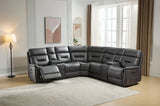 Grey sectional sofa with chaise and recliner, cup holders, in modern living room setting