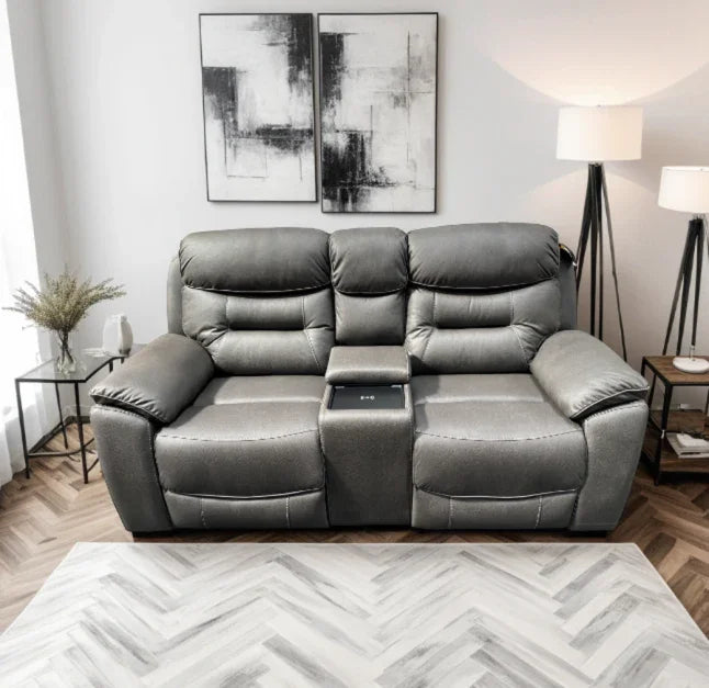 Grey 2 seater reclining sofa with built-in wireless charger and tray in modern living room