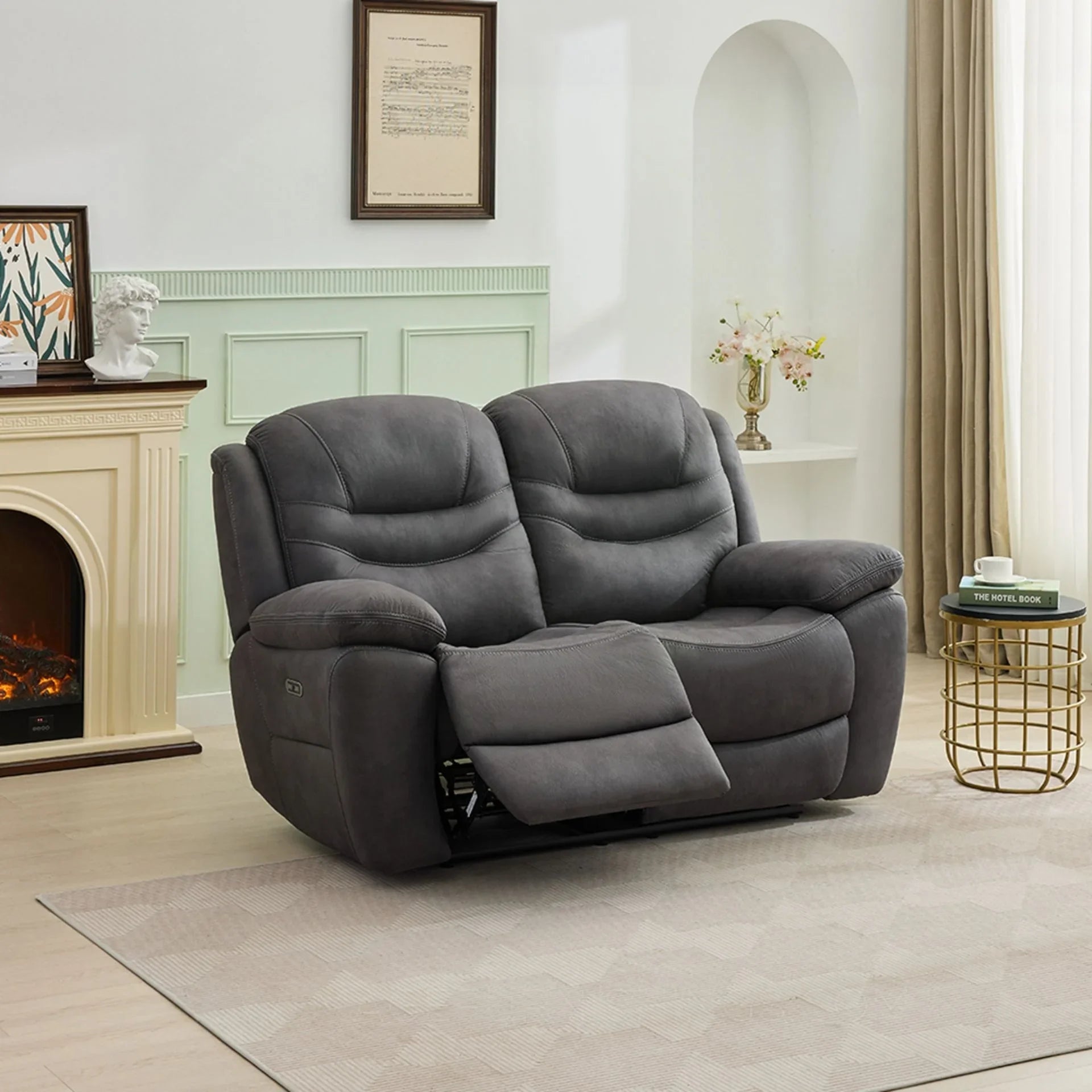 Gunmetal 2-seater loveseat recliner with plush arms in modern living room setting