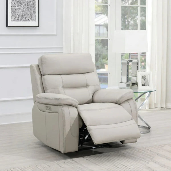 Light grey leather recliner armchair with footrest in modern living room setting
