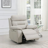 Light grey leather recliner armchair with footrest in modern living room setting