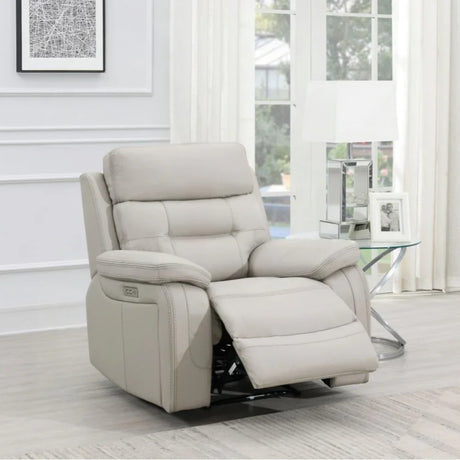 Light grey leather recliner armchair with footrest in modern living room setting