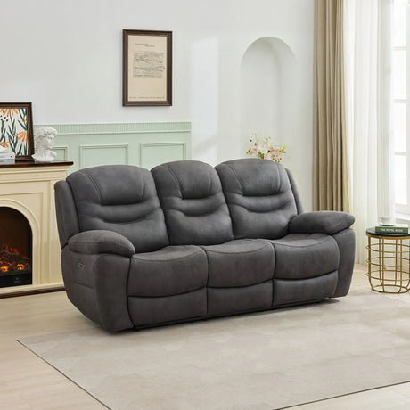 Gunmetal three-seater sofa with plush cushions in bright living room setting