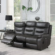 Grey three seater recliner sofa with footrest extended in bright living room setting