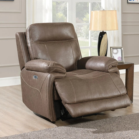 Brown leather recliner chair with extended footrest in living room setting