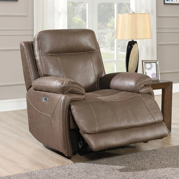 Brown leather recliner chair with extended footrest in living room setting