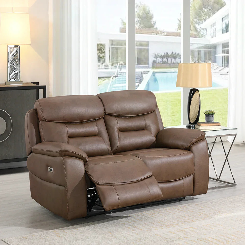 Chestnut brown leather recliner sofa with plush cushions in bright living room setting
