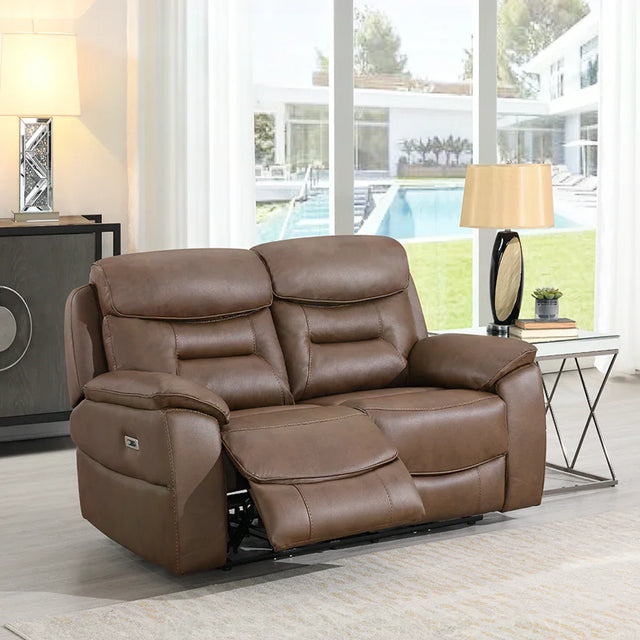 Chestnut brown leather recliner sofa with plush cushions in bright living room setting