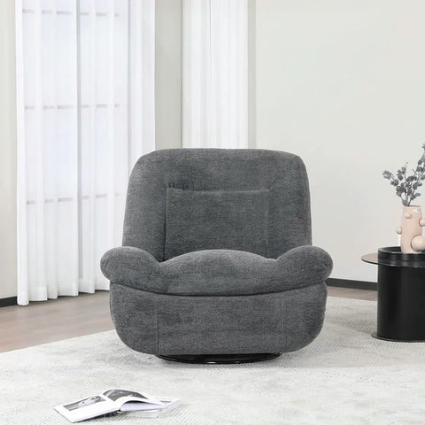 Dark grey reclining chair with cushion on light rug in modern living room