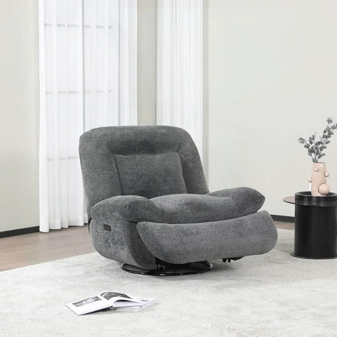 Dark grey reclining chair with plush upholstery in a modern living room setting