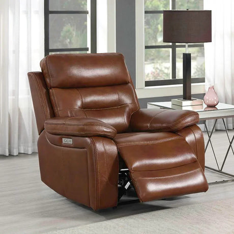 Brown leather recliner chair with footrest extended in modern living room