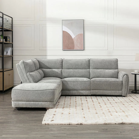 Grey fabric corner sectional sofa with chaise on left, set in modern living room