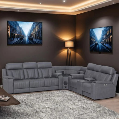 Grey sectional sofa with cup holders and recliner features in modern living room setting
