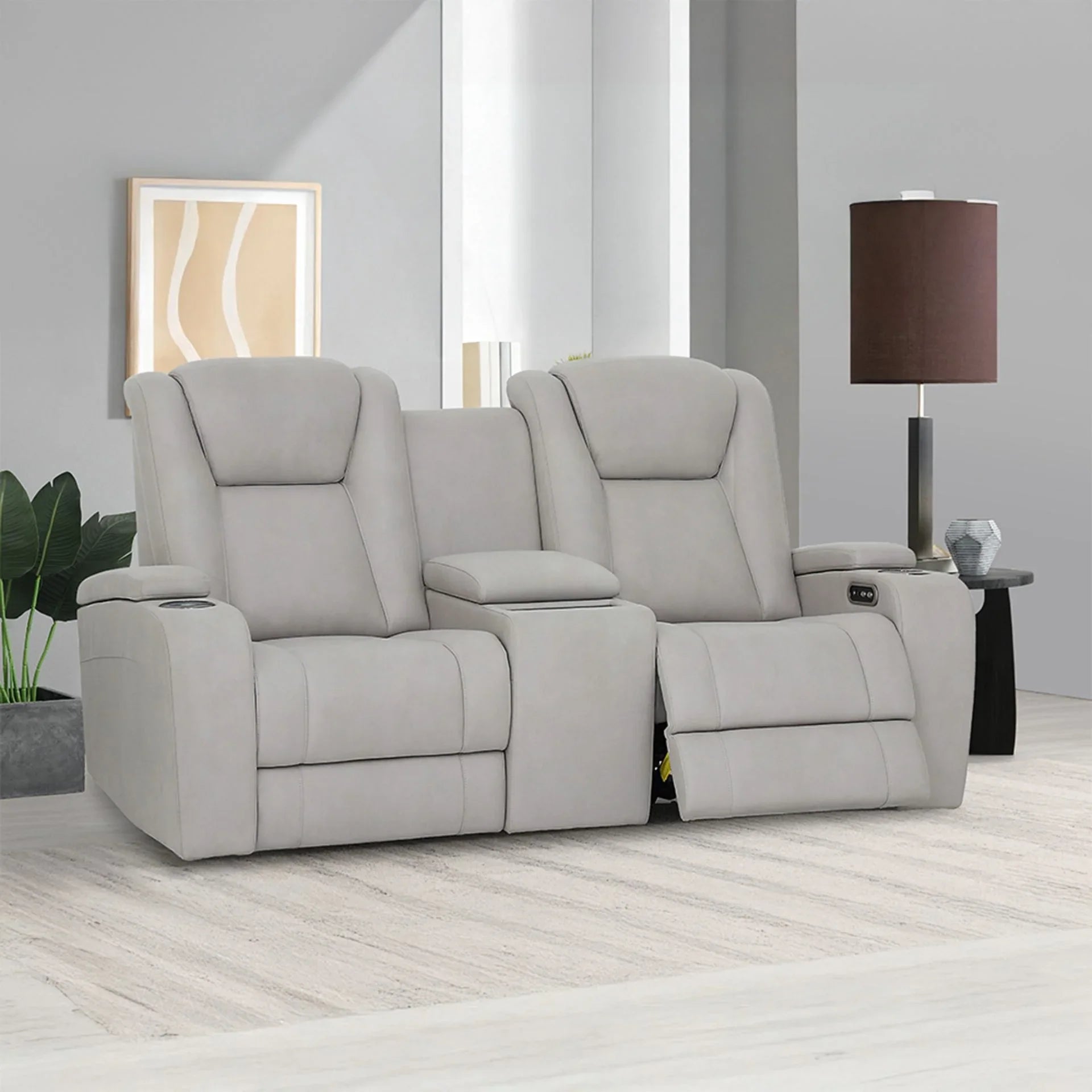Grey recliner sofa with storage armrest and cup holder in modern living room setting