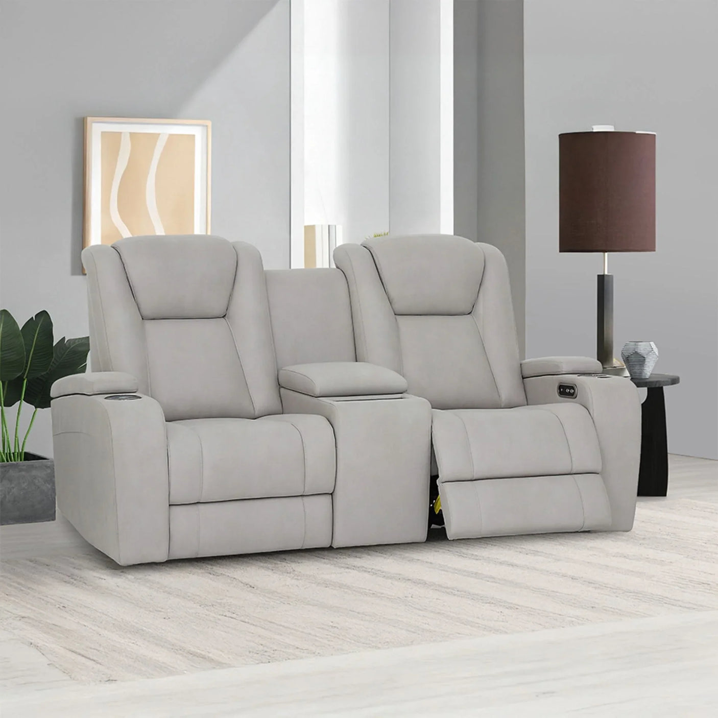 Grey recliner sofa with storage armrest and cup holder in modern living room setting