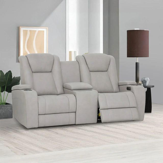 Grey recliner sofa with storage armrest and cup holder in modern living room setting