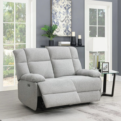 Light grey fabric 2 seater sofa with recliner feature in a modern living room setting