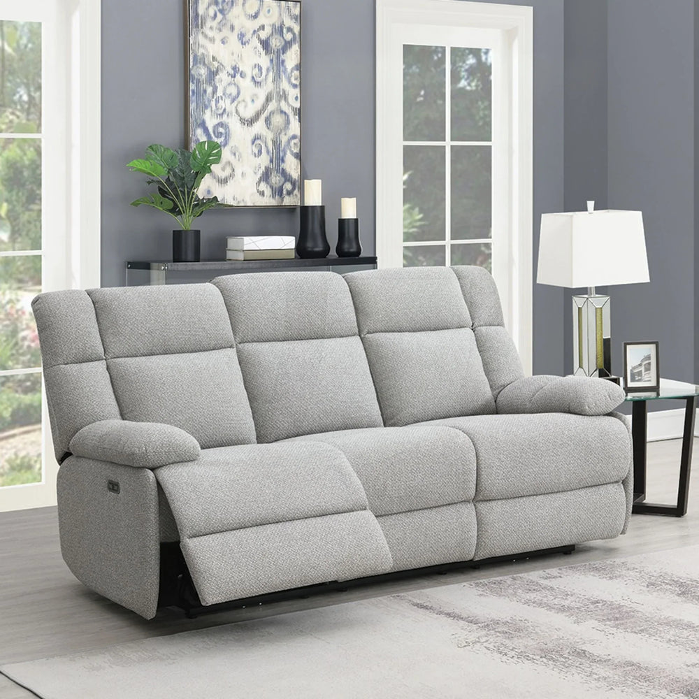 Light grey fabric 3 seater sofa with padded armrests in modern living room setting