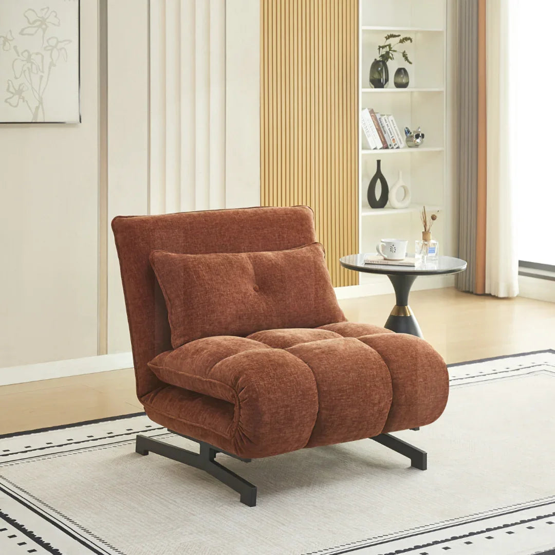 Terra single sofa bed with cushion on black metal legs in modern living room setting