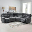 Dark grey manual recliner sectional sofa in modern living room setting on a light rug