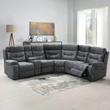 Dark grey manual recliner sectional sofa in modern living room setting on a light rug