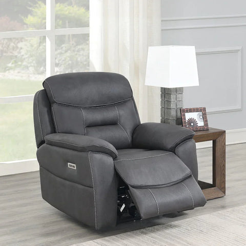 Charcoal grey leather recliner armchair with footrest in modern living room setting